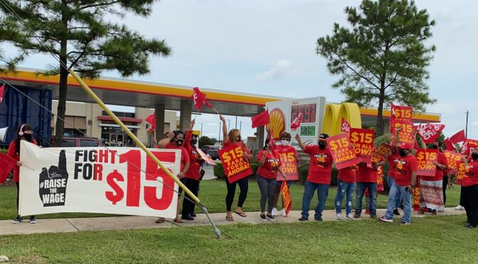 Workers striking outside McDonald's.